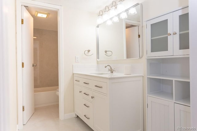 2525 S Dayton Way Unit 1201, Denver, CO 80231 - bathroom featuring vanity and tile patterned floors