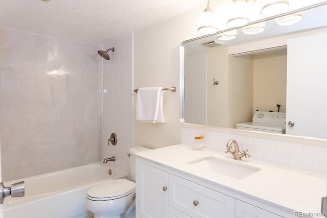2525 S Dayton Way Unit 1201, Denver, CO 80231 - full bathroom with vanity, washer / clothes dryer, and  shower combination