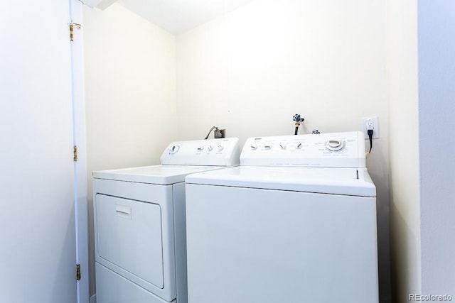 2525 S Dayton Way Unit 1201, Denver, CO 80231 - washroom with washer and clothes dryer