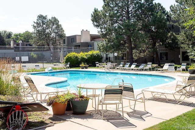 2525 S Dayton Way Unit 1201, Denver, CO 80231 - community pool featuring a patio area