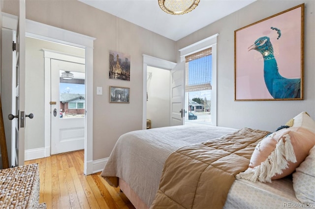 bedroom with light wood-type flooring