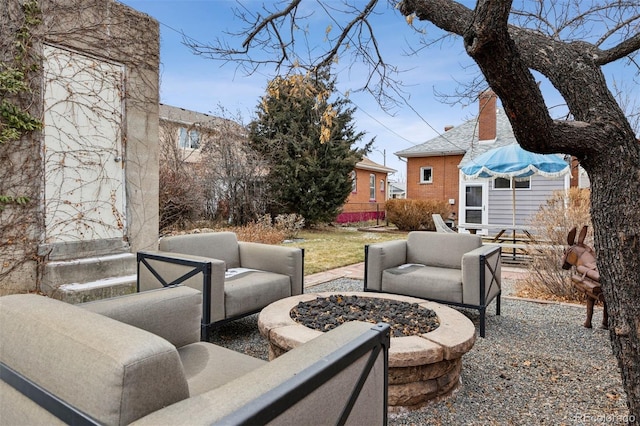 view of patio / terrace featuring a fire pit