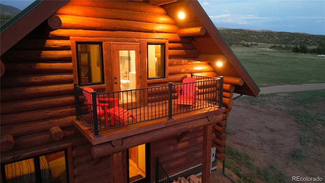 wooden deck featuring a mountain view