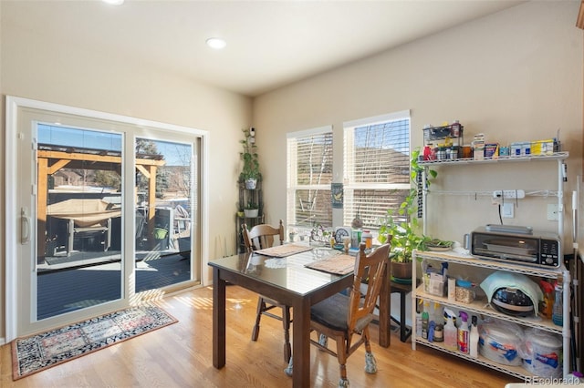 dining room with light hardwood / wood-style flooring