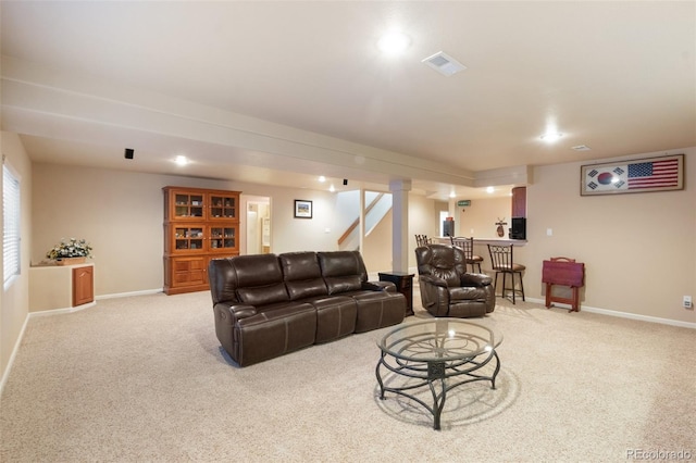 living room with light colored carpet