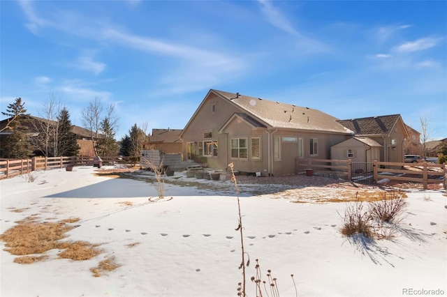 view of snow covered property