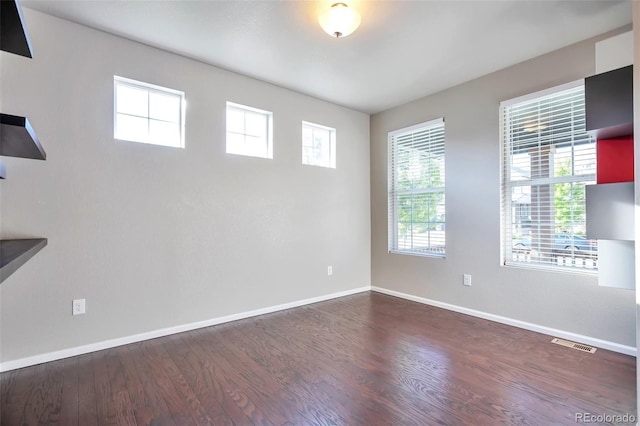 15955 E Otero Cir, Centennial, CO 80112 - spare room featuring wood finished floors and baseboards