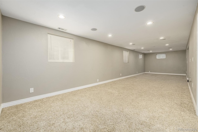 basement featuring carpet flooring