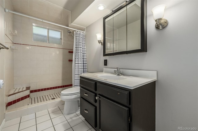 bathroom featuring curtained shower, tile patterned floors, toilet, and vanity