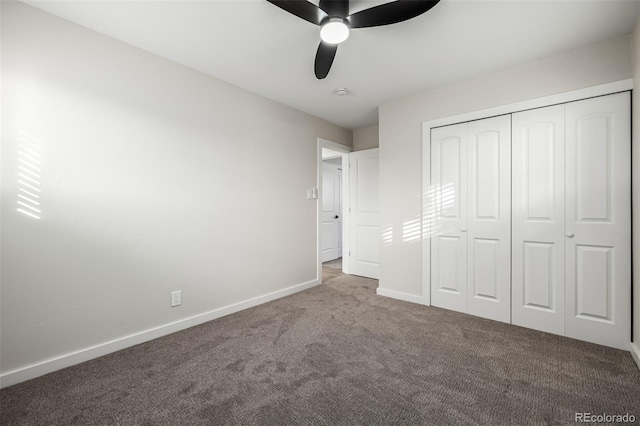 unfurnished bedroom with ceiling fan, a closet, and carpet floors