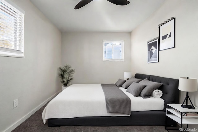 carpeted bedroom featuring ceiling fan