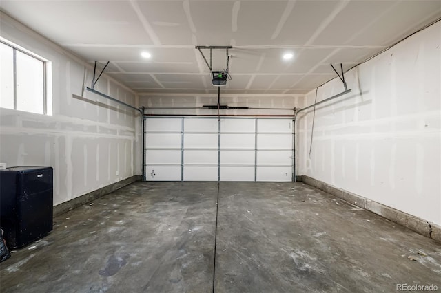 garage featuring a garage door opener