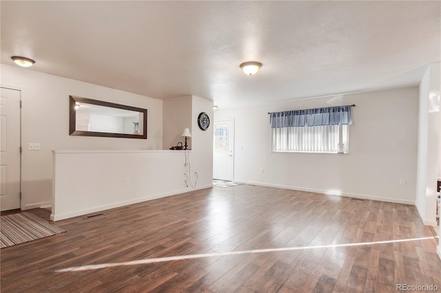 entrance foyer with hardwood / wood-style floors