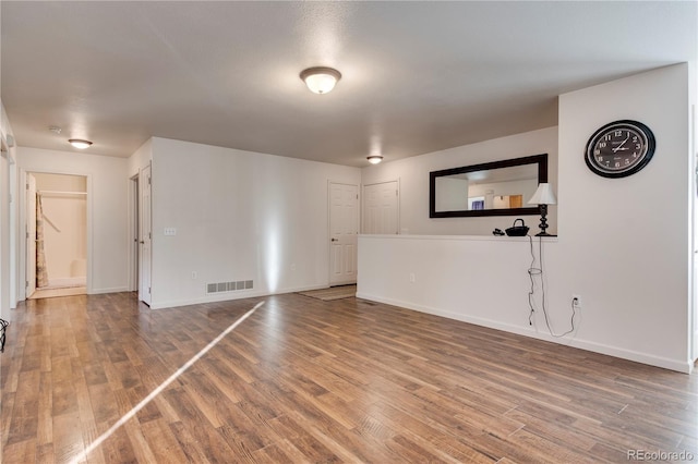 spare room with hardwood / wood-style flooring