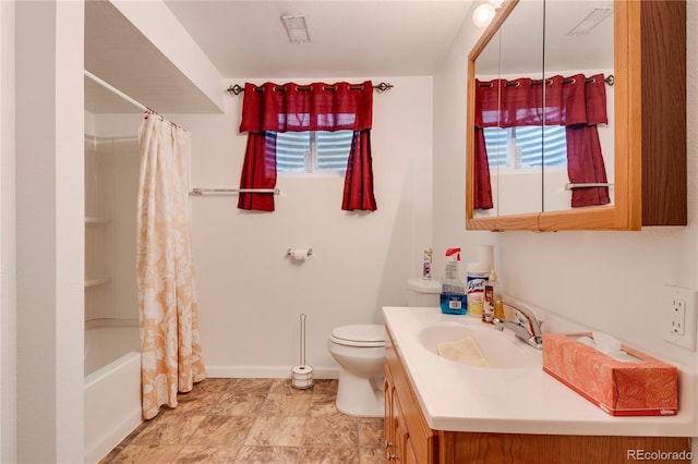 full bathroom featuring vanity, a healthy amount of sunlight, toilet, and shower / bathtub combination with curtain