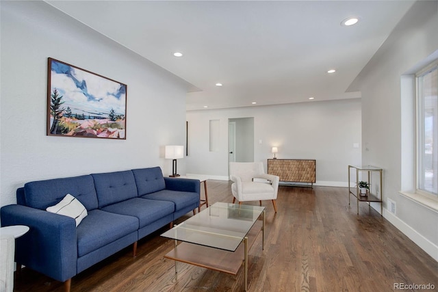 living room with dark hardwood / wood-style floors