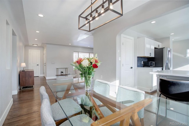 dining room featuring dark wood-type flooring