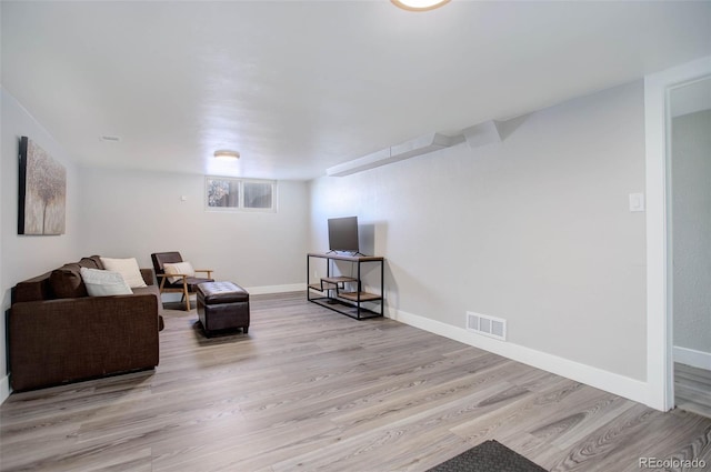 sitting room with light wood-type flooring