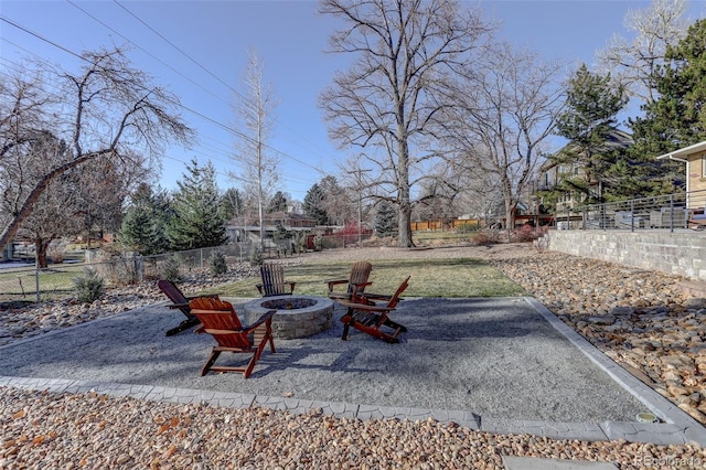 view of patio with an outdoor fire pit