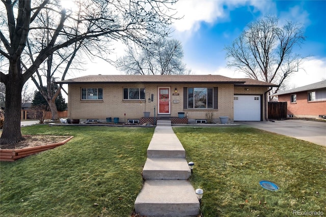 ranch-style home with brick siding, driveway, a front yard, and a garage