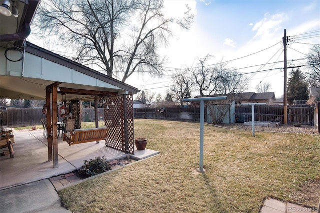 view of yard featuring a patio area and a fenced backyard