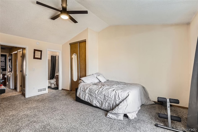 bedroom featuring carpet flooring, a textured ceiling, ceiling fan, and vaulted ceiling