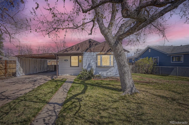 1280 S Quitman St, Denver, CO 80219 - ranch-style home featuring concrete driveway and a carport