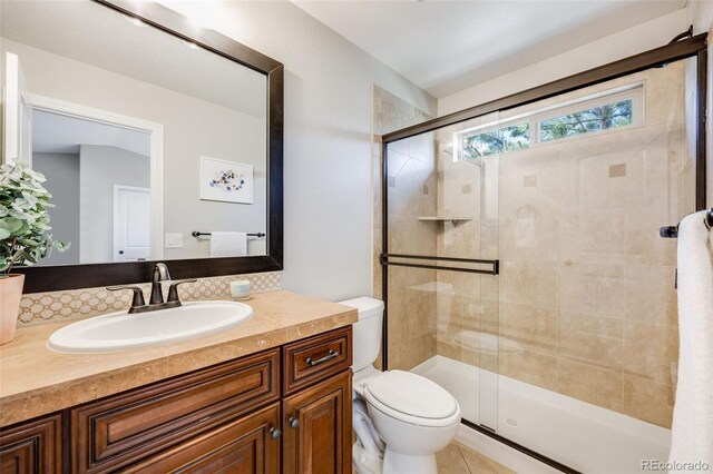 10590 Soulmark Way, Highlands Ranch, CO 80126 - full bathroom with toilet, a shower stall, and vanity