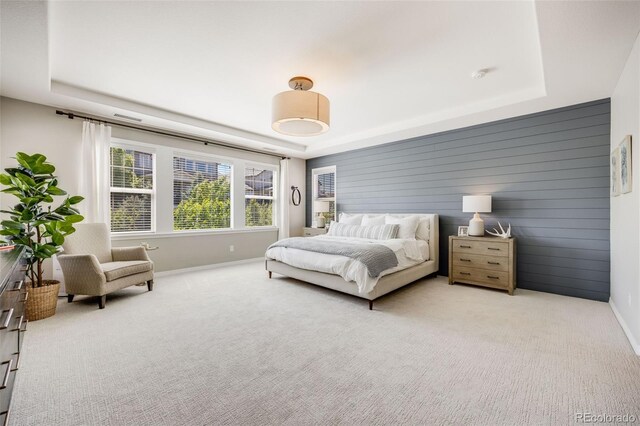 10590 Soulmark Way, Highlands Ranch, CO 80126 - bedroom featuring a raised ceiling, baseboards, and light carpet