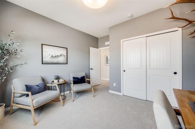 10590 Soulmark Way, Highlands Ranch, CO 80126 - living area featuring light colored carpet and baseboards