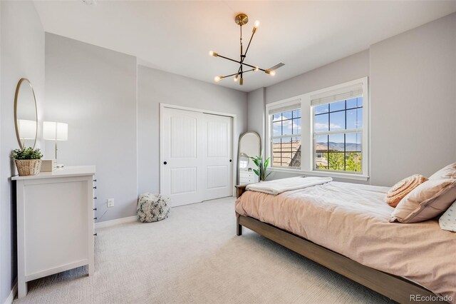 10590 Soulmark Way, Highlands Ranch, CO 80126 - carpeted bedroom with a chandelier, baseboards, and a closet