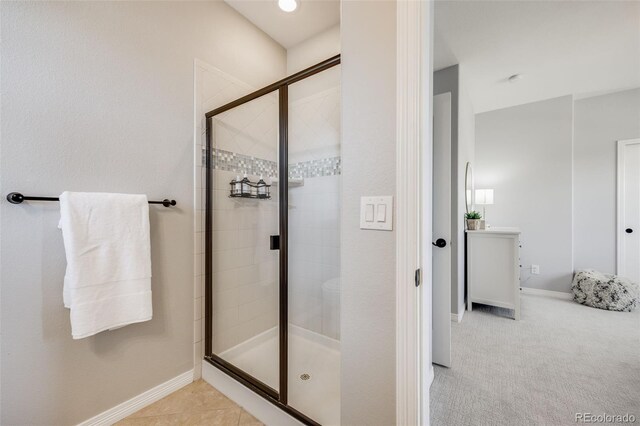 10590 Soulmark Way, Highlands Ranch, CO 80126 - bathroom with a shower stall and baseboards