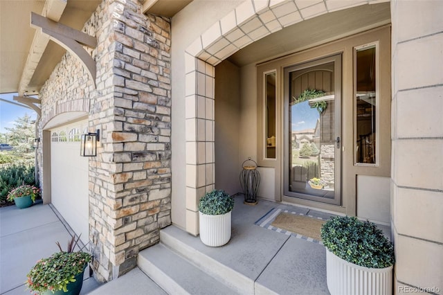 10590 Soulmark Way, Highlands Ranch, CO 80126 - doorway to property featuring stone siding and a porch