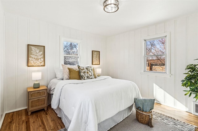 bedroom featuring wood finished floors