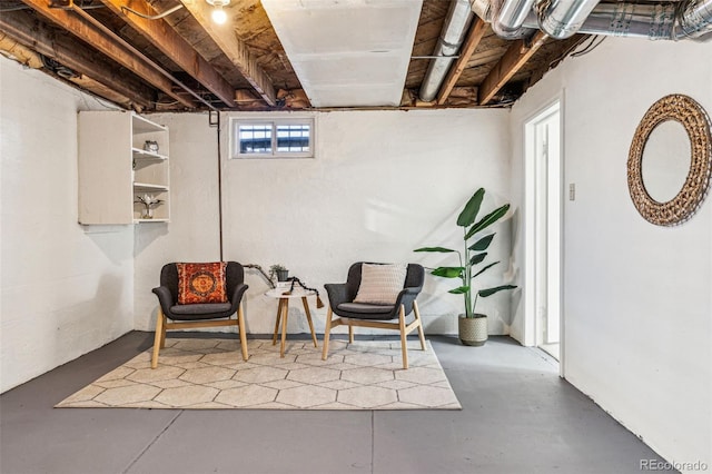 sitting room with finished concrete flooring