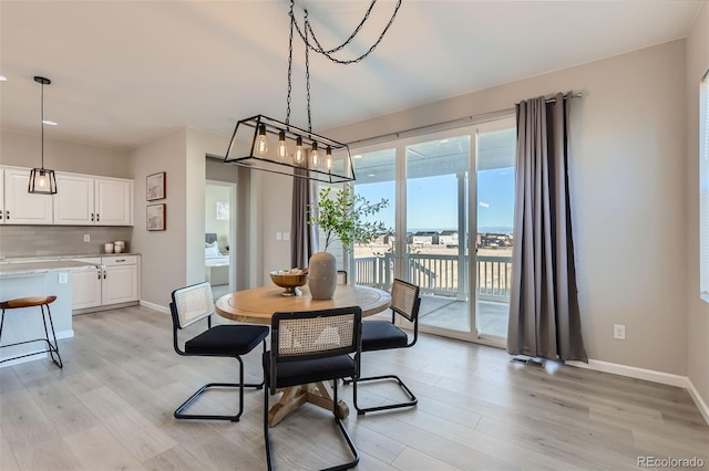 dining space featuring light hardwood / wood-style floors