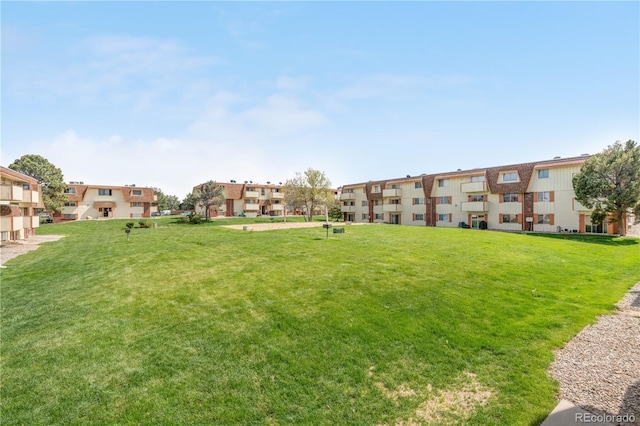 10211 Ura Ln Unit 1-202, Thornton, CO 80260 - view of property's community featuring a yard