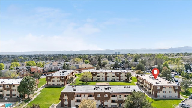 10211 Ura Ln Unit 1-202, Thornton, CO 80260 - aerial view of a mountainous background