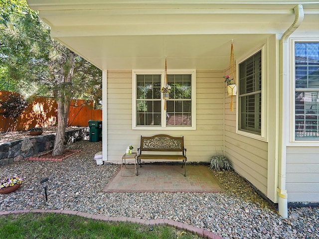 view of patio / terrace featuring fence