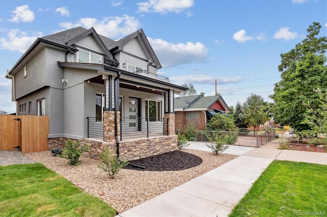 view of front of home featuring covered porch