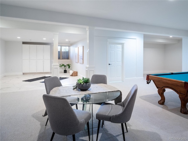 dining space with light colored carpet, pool table, and ornate columns