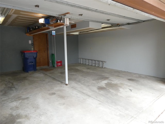 6504 Ralston Rd Unit A, Arvada, CO 80002 - garage featuring a garage door opener
