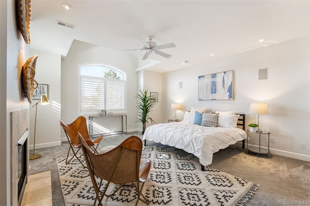 bedroom featuring light carpet and ceiling fan