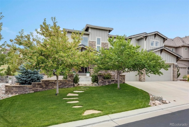 view of front of house featuring a front lawn and a garage