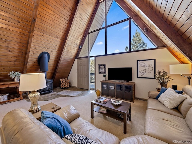 carpeted living room with wood ceiling, high vaulted ceiling, beamed ceiling, and a wood stove