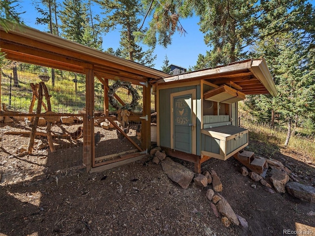 exterior space with an outbuilding