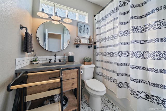1248 Rawhide Cir, Elizabeth, CO 80107 - bathroom with vanity, a textured wall, and a shower with curtain