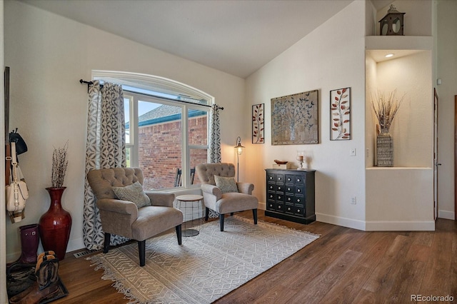 1248 Rawhide Cir, Elizabeth, CO 80107 - living area featuring wood finished floors and high vaulted ceiling