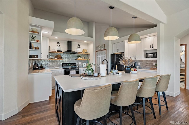 1248 Rawhide Cir, Elizabeth, CO 80107 - kitchen with wall chimney exhaust hood, black appliances, open shelves, tasteful backsplash, and white cabinets