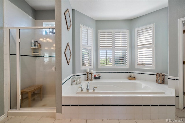 1248 Rawhide Cir, Elizabeth, CO 80107 - bathroom featuring a garden tub, a stall shower, and plenty of natural light
